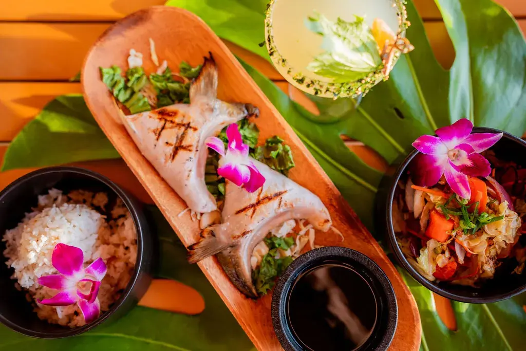 Hamachi Collar at Voyagers: flame-roasted hamachi collar with ginger ponzu, served as a plate with white rice and seasonal mixed vegetables